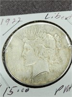 1922 Silver Peace dollar.   Look at the photos