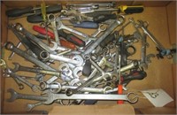 Large assortment of hand tools includes wrenches,