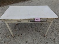PORCELAIN TOP TABLE ON ROLLERS...48X27"