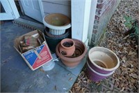 garbage can and flower pots