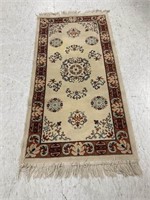 Small Light Colored Hand Knotted Rug