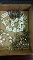 Flat of four costume jewelry sets