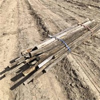 Pallet of wood Poles 8-10ft