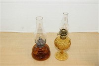 SELECTION OF VINTAGE AMBER GLASS MINI. OIL LAMPS