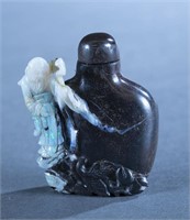 Chinese carved agate snuff bottle.