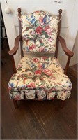Vintage arm chair with bright floral pattern