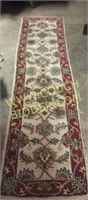 Wool bordered runner rug