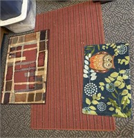 Three smaller area rugs