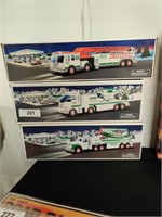 3 Vintage Hess trucks in boxes