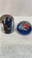 Two fish themed paperweights