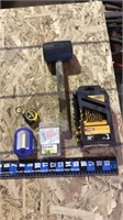 Steel drill bits, 6’ tape measure, sheet metal