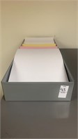 Grey paper holder with printer paper, 6 slots,