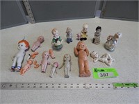 Assorted figurines; dolls and doll parts (some por