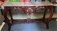 Carved Console Table With Marble Top. Marble has