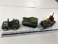 3 tin army vehicles