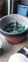 2 large plastic tubs and water hose