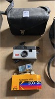 Kodak Instamatic camera, accessories and bag