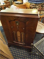 Vintage floor radio in wooden cabinet, (front
