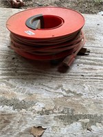 Extension cord reel with cord