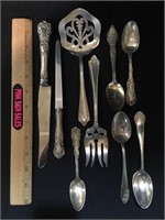 (9) Pieces of Sterling Flatware.