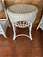 White wicker side table with glass top