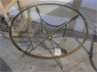 Brass and glass round cocktail table (one brass
