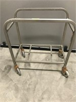 METAL RACK ON LARGE CASTERS