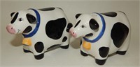 Happy Black & White Cows Wearing Bells
