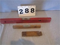 Lot of 2 wooden levels and wood carpenter’s ruler