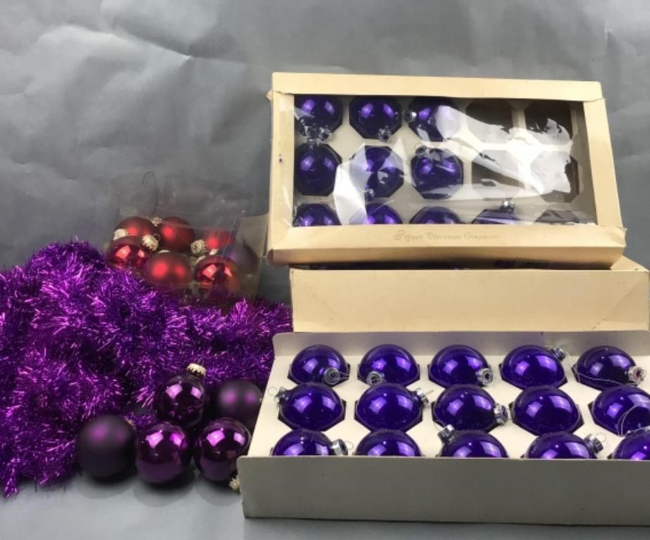 Purple Christmas ornaments and purple garland