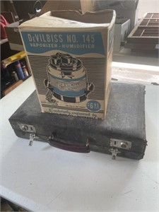 Old briefcase, antique humidifier