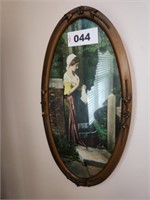 21" OVAL RAISED GLASS FRAME WOMAN SEWING PICTURE