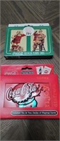 Four decks of coca cola playing cards in tins