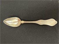 German sterling silver serving spoon .