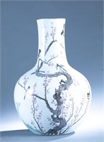 Chinese famille rose magpie and prunus vase.