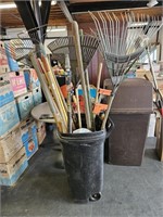 Garbage Can Full Of Rakes & Outdoor Tools