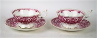 TWO COALPORT CUPS AND SAUCERS