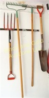Four long handle garden tools