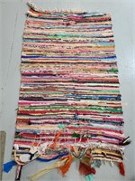 Large colorful woven fabric rug