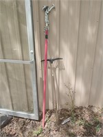 Pole lopper and a hard plastic rake