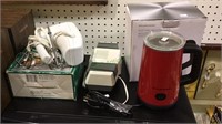 Shelf  lot, one electric milk frother from