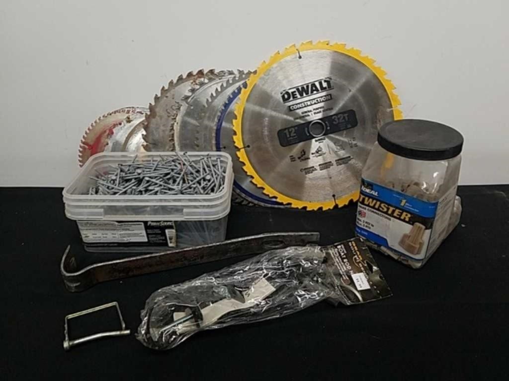 Assorted saw blades, wire connectors, nails, a