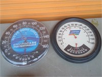 two large thermometers