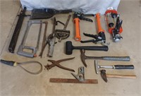 Shop tools including caulking guns, hammers and