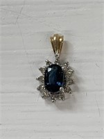 Blue Sapphire And Diamond Pendant Set In 10kt