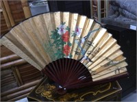 Golden paper fan