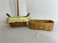 Two Longaberger baskets one is signed