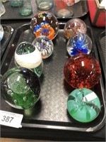 Eight Assorted Paper Weights.