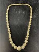 Old Asian bone tapered strand of floral beads with