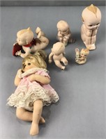 Porcelain baby figures largest sitting has broken